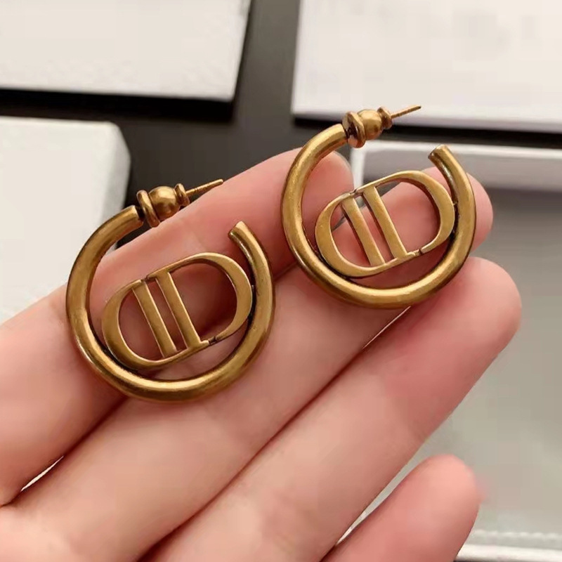 Replica Designer Dior Simple Metal Letter Hollow Circle Stud Earrings