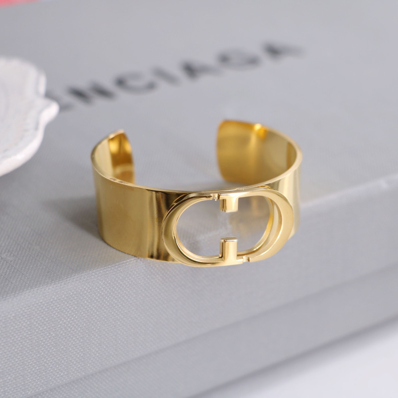 Replica Designer Dior Simple Titanium Steel Hollow Letter Open Bracelet